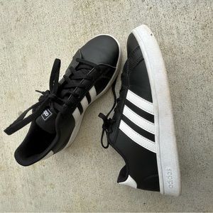 Adidas youth size 4.5 black with white sneaker
